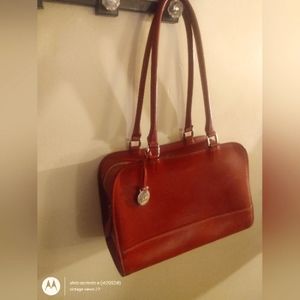 Dooney & Bourke Alto Collection.